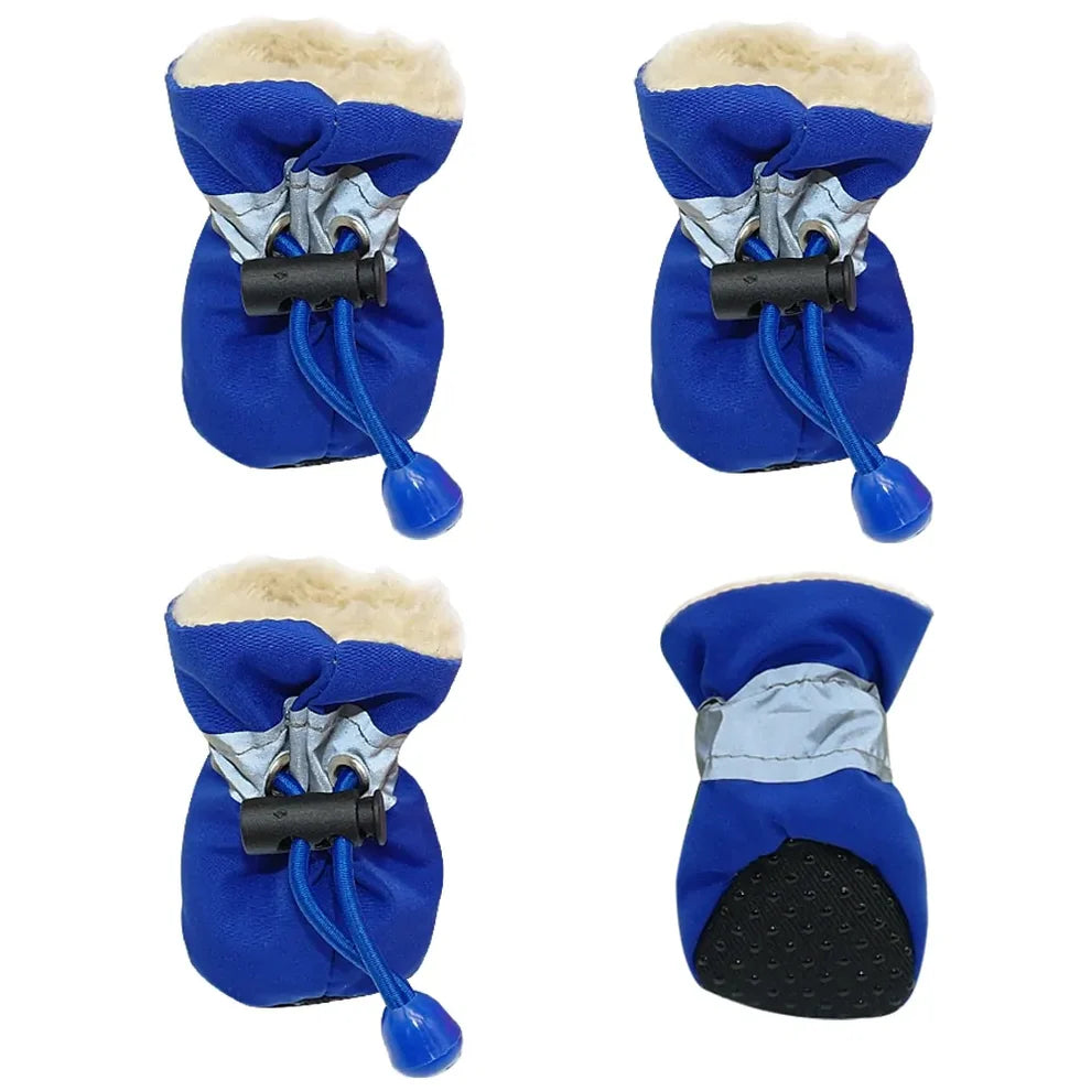 Four blue dog boots with fleece lining and adjustable drawstrings. The boots are shown from various angles, highlighting features like the soft inner lining, reflective strip, and textured sole for grip. Designed to protect a dog's paws from cold weather and rough surfaces, they offer both functionality and comfort.

